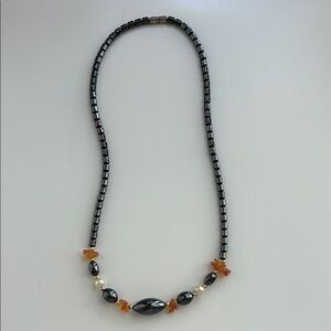 elegant black and gold beaded necklace